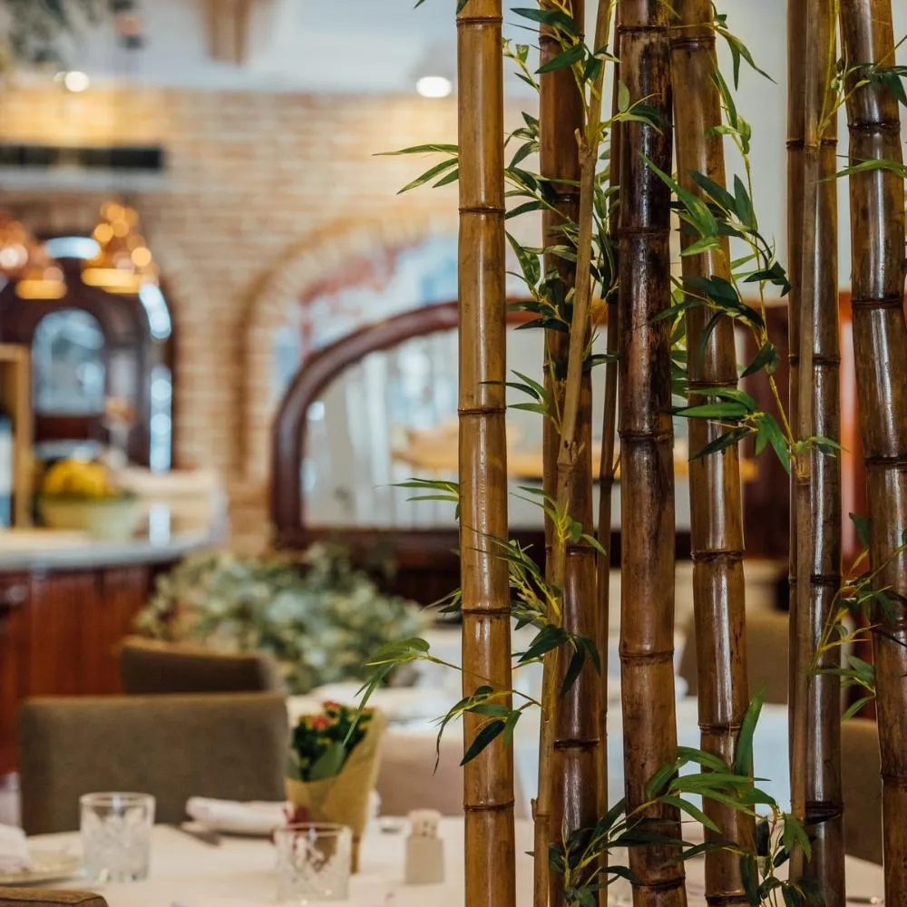 Dining room divided by bamboo canes